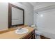 Small bathroom with shower/tub combo at 9887 Live Oak Ct, Douglasville, GA 30135