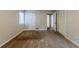 Spacious bedroom with neutral walls and carpet at 9887 Live Oak Ct, Douglasville, GA 30135