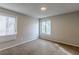 Bright bedroom with carpet and window coverings at 9887 Live Oak Ct, Douglasville, GA 30135