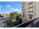 View of building and surrounding landscape from a balcony at 2626 Peachtree Nw Rd # 704, Atlanta, GA 30305