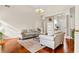 Light-filled living room featuring hardwood floors and ample seating at 3771 Mason Ridge Dr, Winston, GA 30187