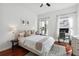 Bright bedroom with hardwood floors and a workspace at 870 Inman Village Ne Pkwy # 308, Atlanta, GA 30307