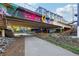 Walking path under a bridge with vibrant artwork at 870 Inman Village Ne Pkwy # 308, Atlanta, GA 30307