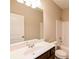 Bathroom with single vanity, shower, and toilet at 1422 Sand Way, Lawrenceville, GA 30045