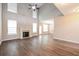 Open living room with high ceilings and hardwood floors at 1422 Sand Way, Lawrenceville, GA 30045