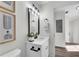 Stylish bathroom with a white vanity and black framed mirror at 2550 Laurel Ridge Dr, Decatur, GA 30033