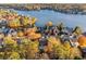 Luxury home community with lake views and mature trees in autumn at 2195 Lake Shore Lndg, Alpharetta, GA 30005