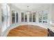 Breakfast nook with hardwood floors and bay windows offering natural light at 2195 Lake Shore Lndg, Alpharetta, GA 30005
