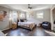Spacious bedroom with dark hardwood floors and a large closet at 4246 Antler Se Trl, Smyrna, GA 30082