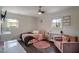 Charming bedroom with hardwood floors and a cozy sitting area at 4246 Antler Se Trl, Smyrna, GA 30082