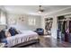 Bright bedroom featuring hardwood floors and ample closet space at 4246 Antler Se Trl, Smyrna, GA 30082