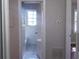 Bathroom with vintage tile floor and white bathtub at 5621 Zanola Sw Dr, Mableton, GA 30126