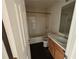 Clean bathroom with a bathtub and shower at 5750 Old Carriage Dr, Atlanta, GA 30349
