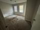 Spacious bedroom with neutral walls and carpet at 1182 Bailing Dr, Lawrenceville, GA 30043