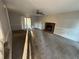 Living room with brick fireplace and carpet at 1182 Bailing Dr, Lawrenceville, GA 30043
