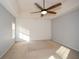 Bright bedroom with gray walls, a ceiling fan, and a stylish shiplap accent wall at 138 Slippery Rock Ct, Villa Rica, GA 30180