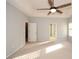 Spacious bedroom with ceiling fan and ample natural light at 138 Slippery Rock Ct, Villa Rica, GA 30180
