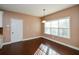 Bright breakfast area with hardwood floors and window at 138 Slippery Rock Ct, Villa Rica, GA 30180