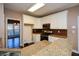 Kitchen with granite countertops and white cabinets at 138 Slippery Rock Ct, Villa Rica, GA 30180