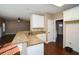 Kitchen with granite countertops and white cabinets at 138 Slippery Rock Ct, Villa Rica, GA 30180