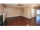Spacious living room with hardwood floors and fireplace at 138 Slippery Rock Ct, Villa Rica, GA 30180