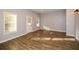 Bright living area with hardwood floors and access to exterior at 138 Slippery Rock Ct, Villa Rica, GA 30180