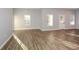 Spacious living room with hardwood floors and lots of natural light at 138 Slippery Rock Ct, Villa Rica, GA 30180