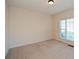 Spacious office with neutral carpeting and large window at 138 Slippery Rock Ct, Villa Rica, GA 30180