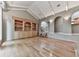 Living room with hardwood floors, built-in shelving, and high ceilings at 3771 Club Nw Dr, Kennesaw, GA 30144