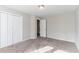 Bedroom with double-door closet and access to bathroom at 6016 King Way Walk, Lithonia, GA 30058