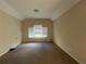 Large main bedroom with carpeted floors and vaulted ceilings at 74 Gardenia Nw Dr, Atlanta, GA 30314