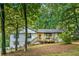 Charming ranch home with a newly renovated deck and landscaping at 2152 Tourney Dr, Marietta, GA 30062