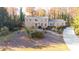 Brick house with landscaped yard and long driveway at 2237 Gunstock Dr, Stone Mountain, GA 30087