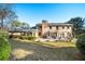 Spacious backyard with a large patio, pergola, and lush landscaping at 2237 Gunstock Dr, Stone Mountain, GA 30087