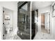 Modern bathroom with dark tile walk-in shower at 2237 Gunstock Dr, Stone Mountain, GA 30087
