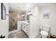 Modern bathroom with geometric tile shower and double vanity at 2237 Gunstock Dr, Stone Mountain, GA 30087