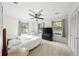 Well-lit bedroom with ceiling fan and lots of natural light at 2237 Gunstock Dr, Stone Mountain, GA 30087