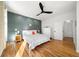 Spacious primary bedroom with hardwood floors and a view to the hallway at 2237 Gunstock Dr, Stone Mountain, GA 30087