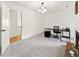 Bright home office with a desk and chair, and views to the upper floor at 2237 Gunstock Dr, Stone Mountain, GA 30087