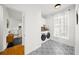 Bright laundry room with washer, dryer, and stylish tile floor at 2237 Gunstock Dr, Stone Mountain, GA 30087