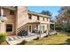 Relaxing patio area with seating, a pergola, and a grill at 2237 Gunstock Dr, Stone Mountain, GA 30087