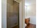 Bathroom with shower stall and wood vanity at 3455 Andrea Lee Ct, Snellville, GA 30039