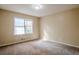 Spacious bedroom with neutral walls and carpet at 3455 Andrea Lee Ct, Snellville, GA 30039