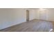 Bright basement bedroom featuring new flooring and a closet at 4639 Hardwood Rd, Stone Mountain, GA 30083