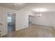 Bright dining room with light wood flooring and an open layout at 4639 Hardwood Rd, Stone Mountain, GA 30083