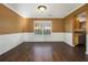 Formal dining room with hardwood floors and chair railing at 1896 Watercrest Dr, Jonesboro, GA 30236