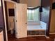 Primary bathroom with soaking tub and separate toilet at 3668 Deer Springs Pkwy, Ellenwood, GA 30294