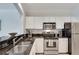 Modern kitchen with granite countertops and stainless steel appliances at 1122 Westchester Ne Rdg, Atlanta, GA 30329