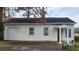 White exterior with garage and covered entryway at 244 Mirandy Way, Lawrenceville, GA 30044