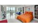 Studio apartment bedroom with orange bedding and built-in shelving at 2870 Pharr Court S Nw # 2703, Atlanta, GA 30305